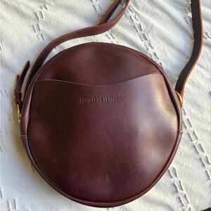 Portland Leather circle purse with shoulder strap